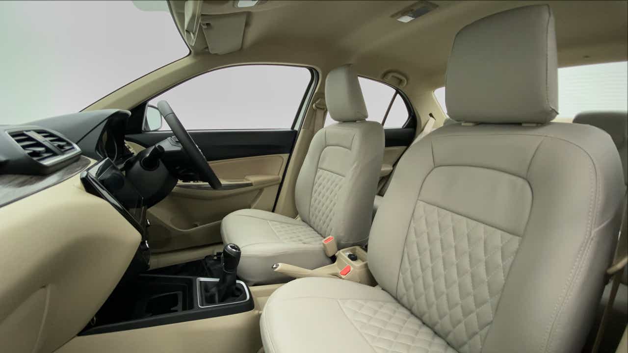 Front seat and dashboard view of a Maruti Suzuki Dzire 2018-2023