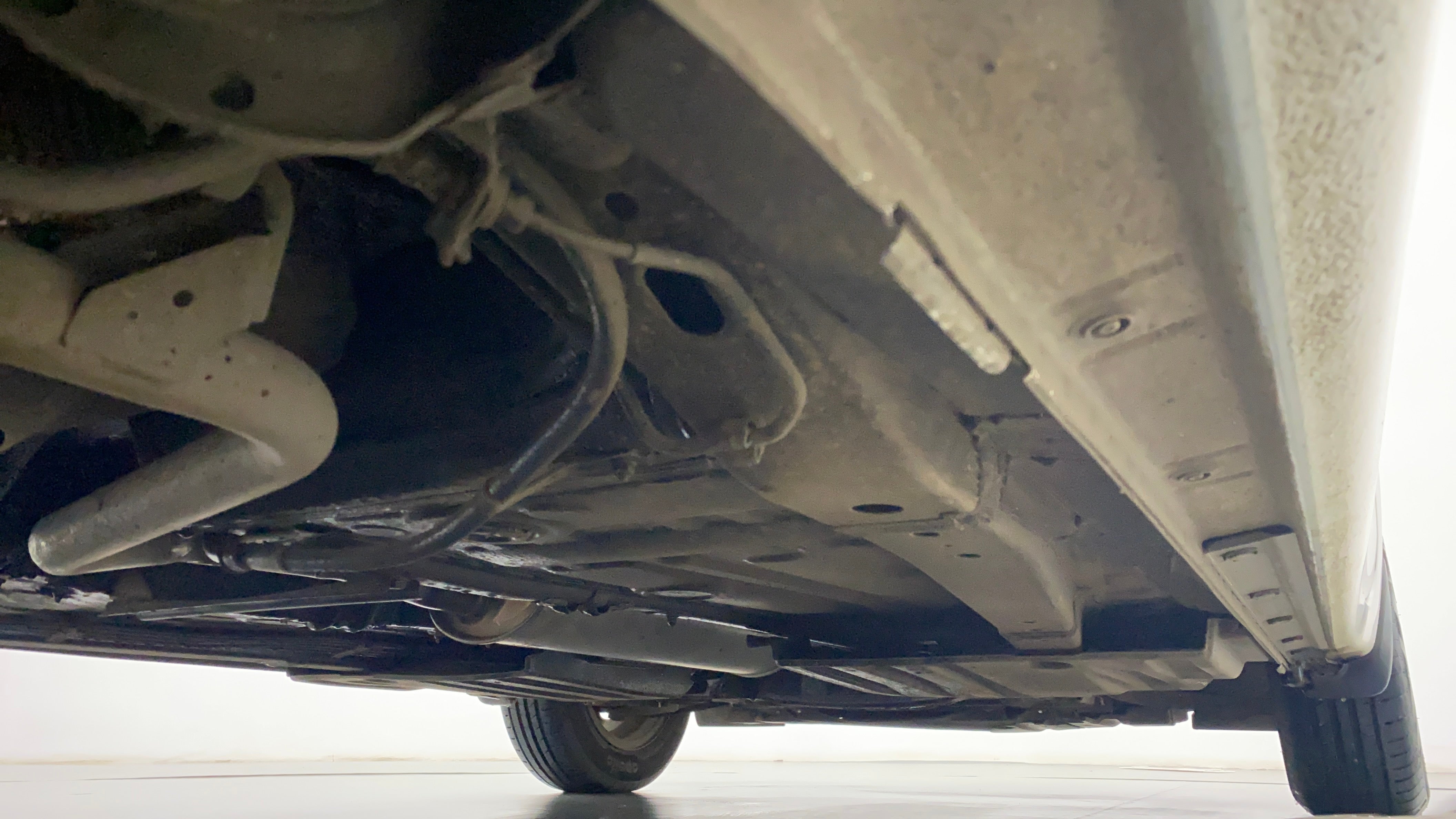 Undercarriage view of a Maruti Suzuki Dzire 2018-2023