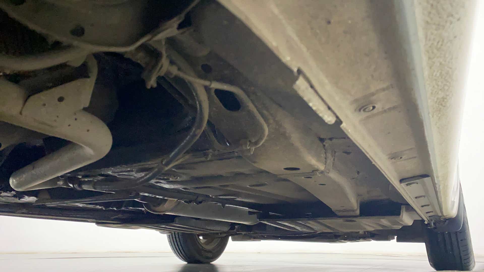 Undercarriage view of a Maruti Suzuki Dzire 2018-2023