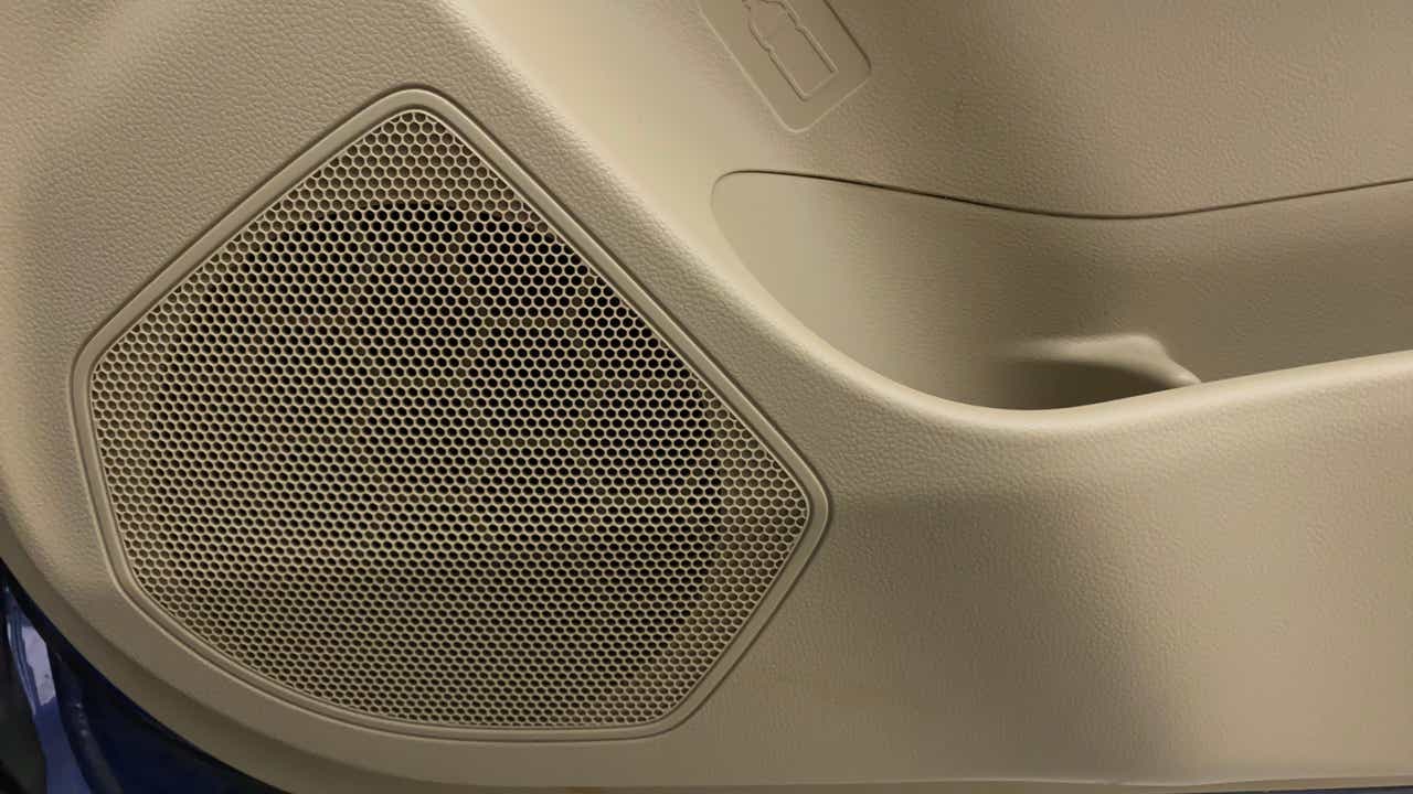 Door speaker and pocket of a Maruti Suzuki Dzire 2018-2023