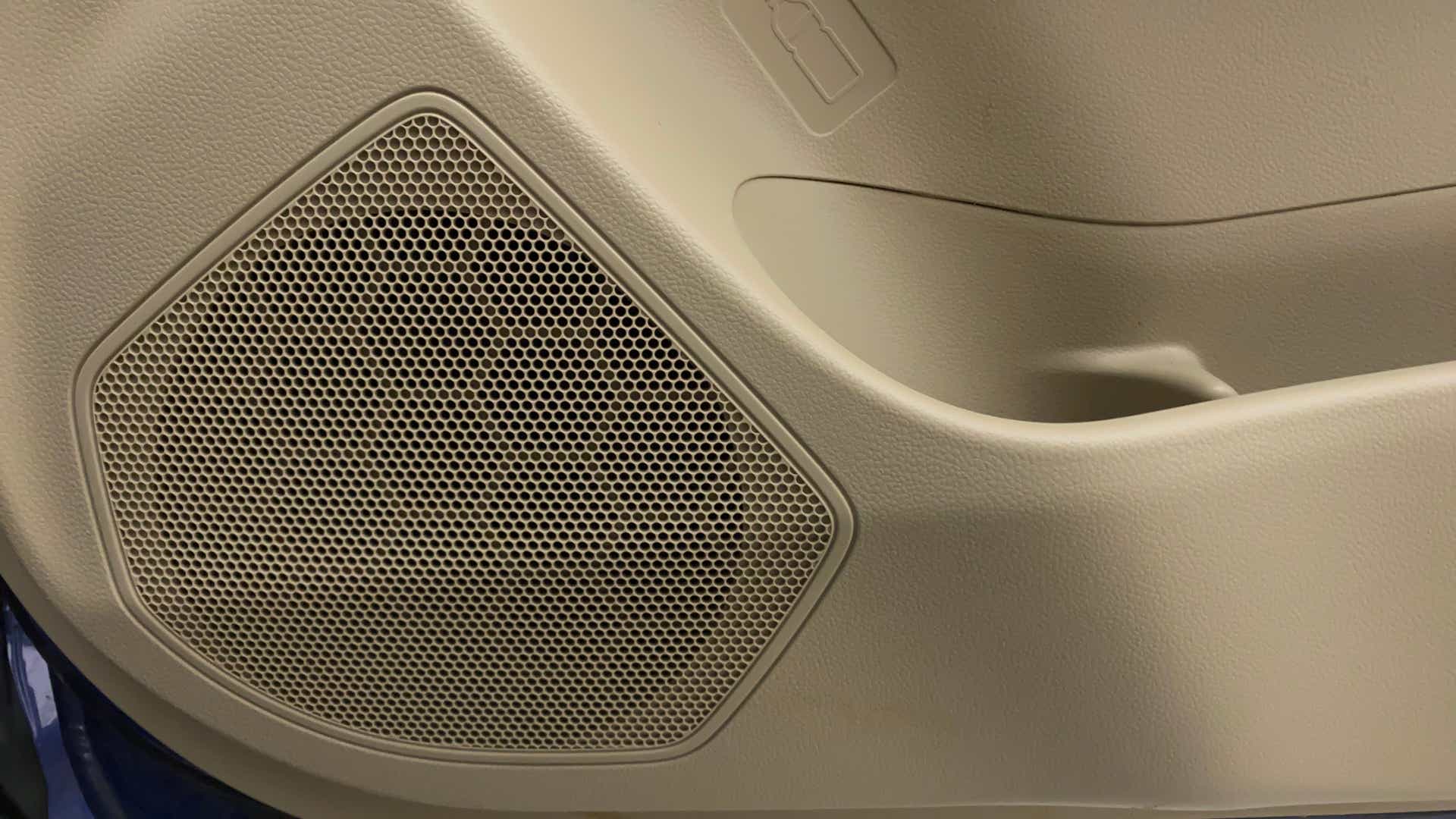 Door speaker and pocket of a Maruti Suzuki Dzire 2018-2023