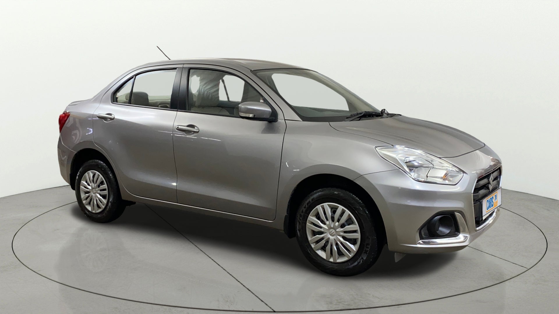 Front and side view of a Maruti Suzuki Dzire 2018-2023