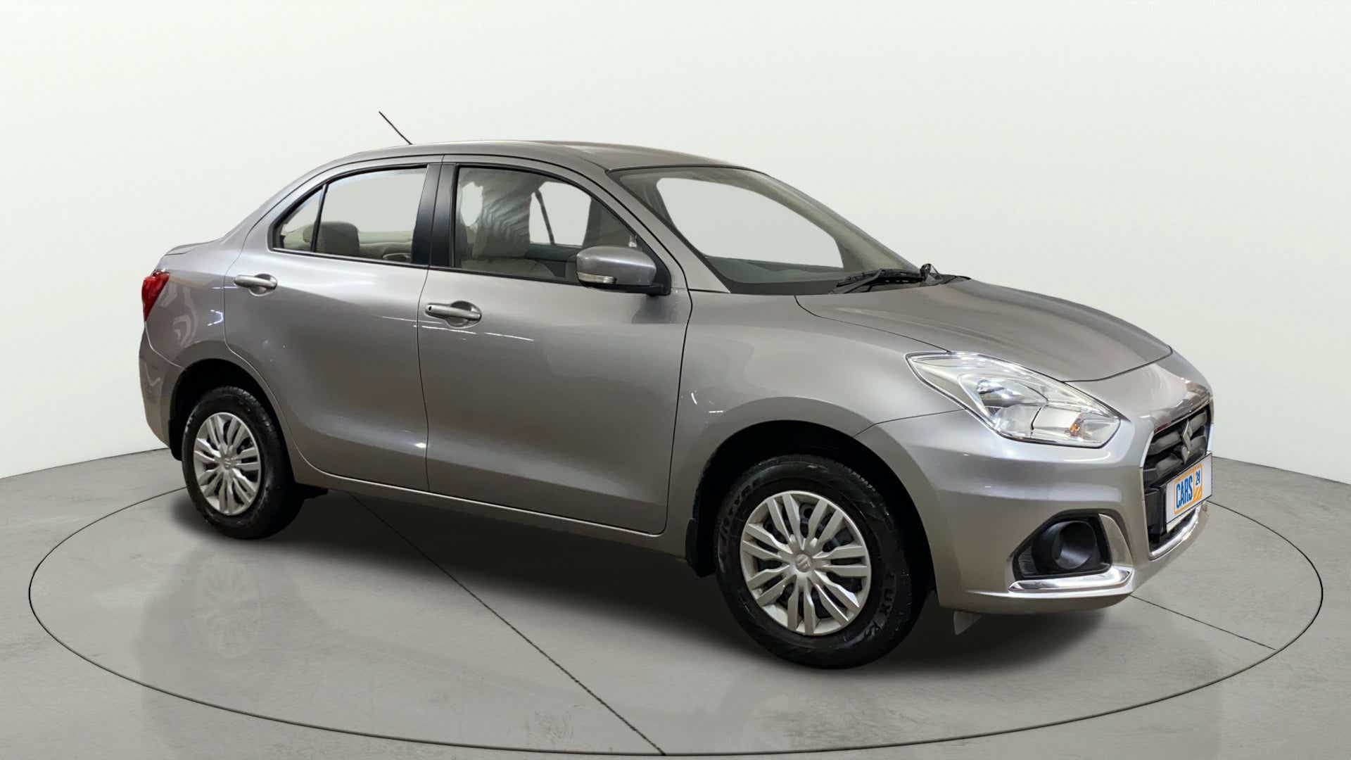 Front and side view of a Maruti Suzuki Dzire 2018-2023