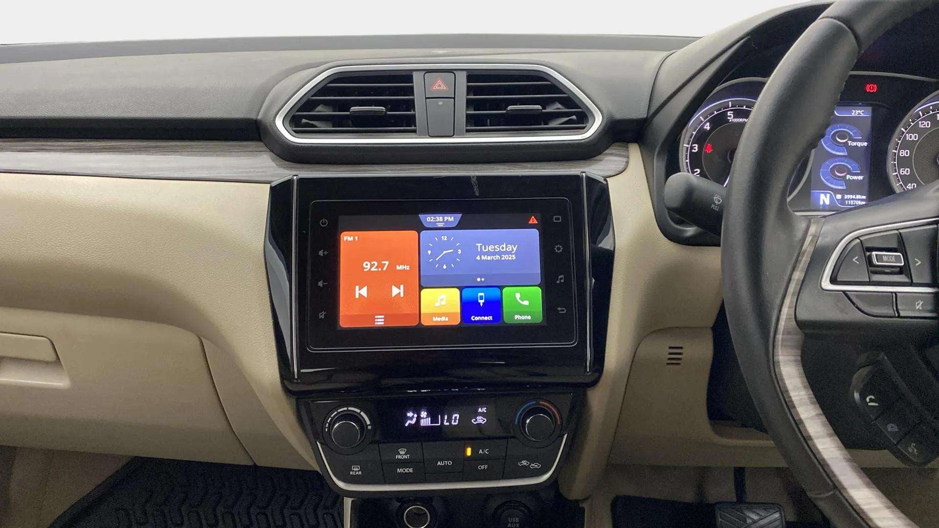 Interior dashboard of a Maruti Suzuki Dzire 2018-2023