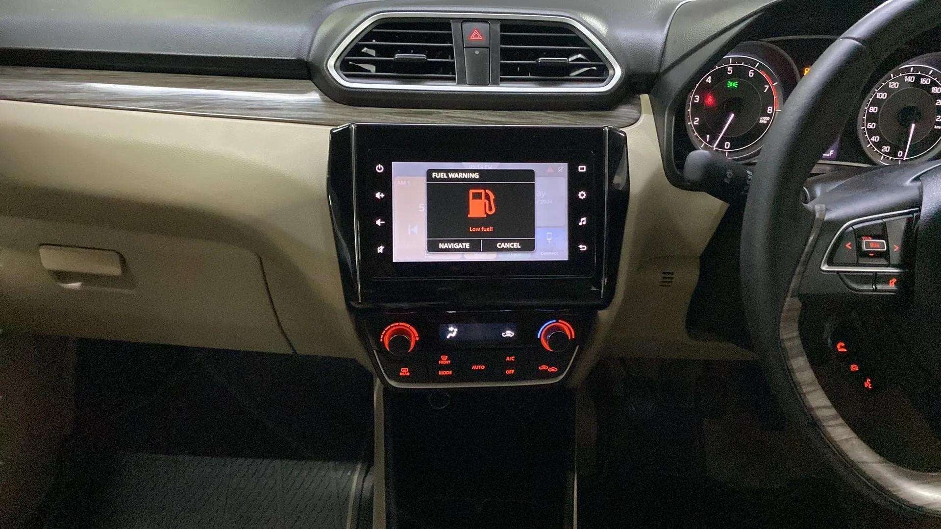 Interior dashboard of a Maruti Suzuki Dzire 2018-2023