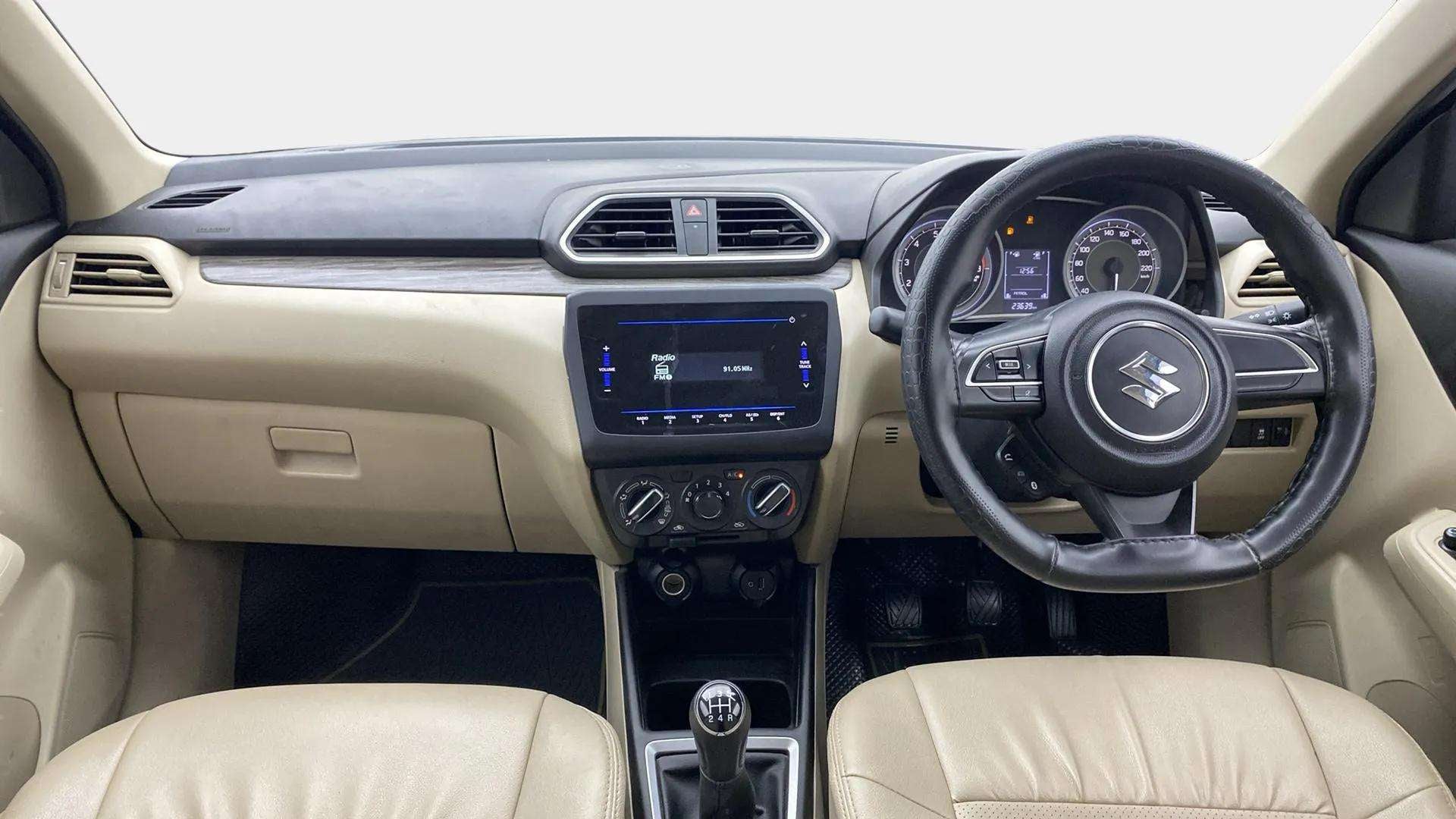 Interior dashboard of a Maruti Suzuki Dzire 2018-2023