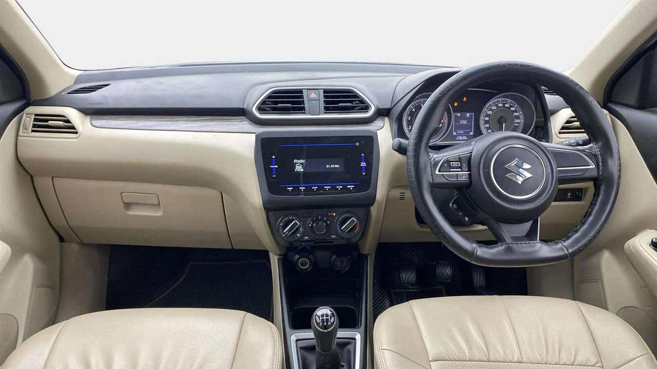 Interior dashboard of a Maruti Suzuki Dzire 2018-2023