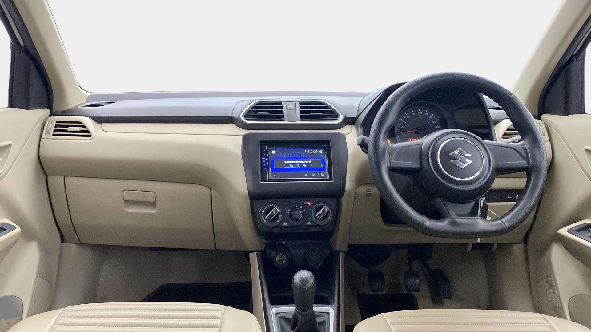 Interior dashboard of a Maruti Suzuki Dzire 2018-2023
