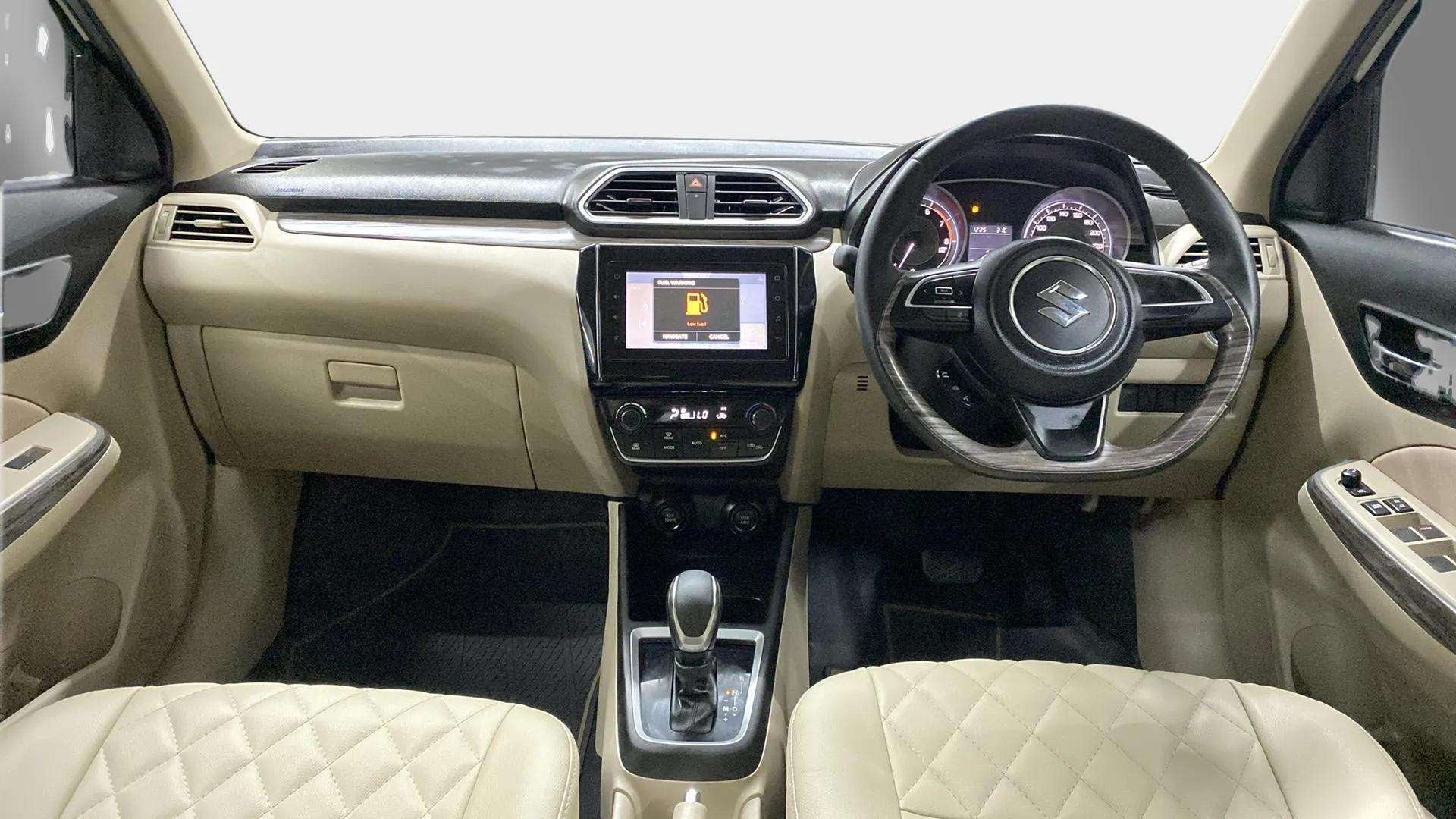 Dashboard and steering wheel of a Maruti Suzuki Dzire 2018-2023