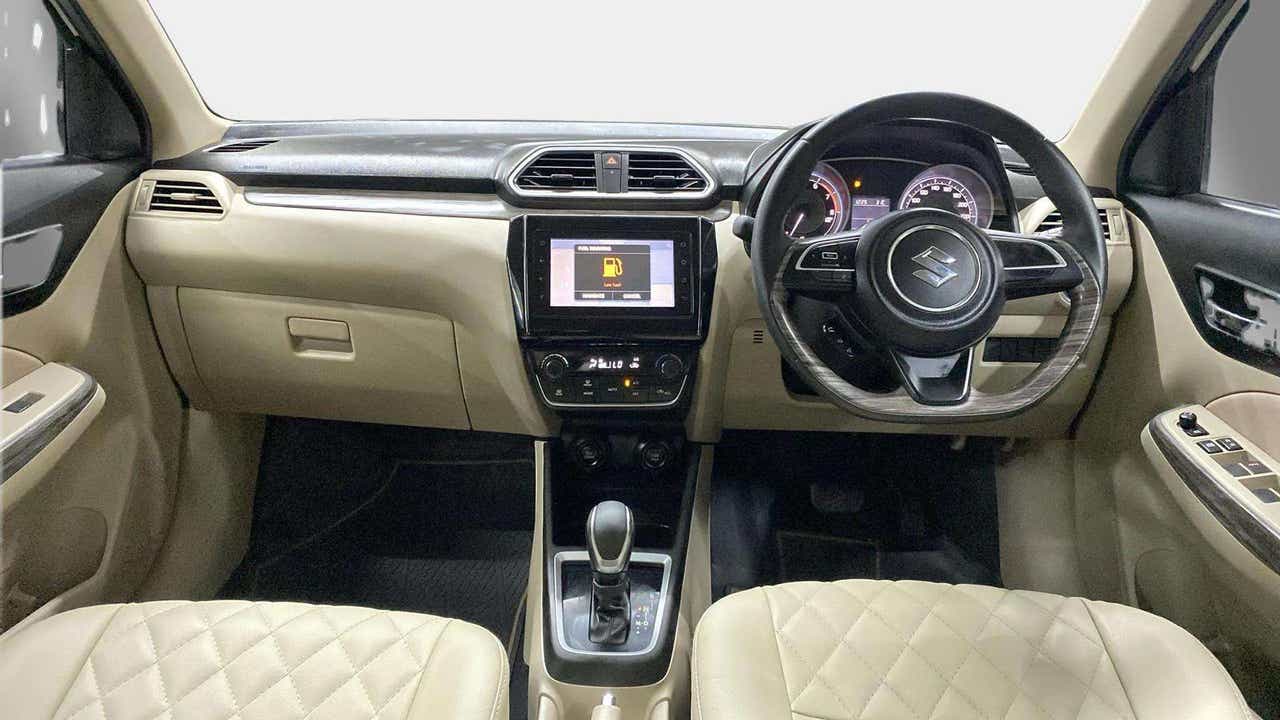 Dashboard and steering wheel of a Maruti Suzuki Dzire 2018-2023