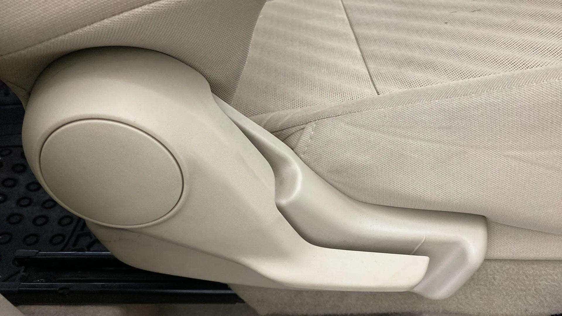 Seat adjustment lever of a Maruti Suzuki Dzire