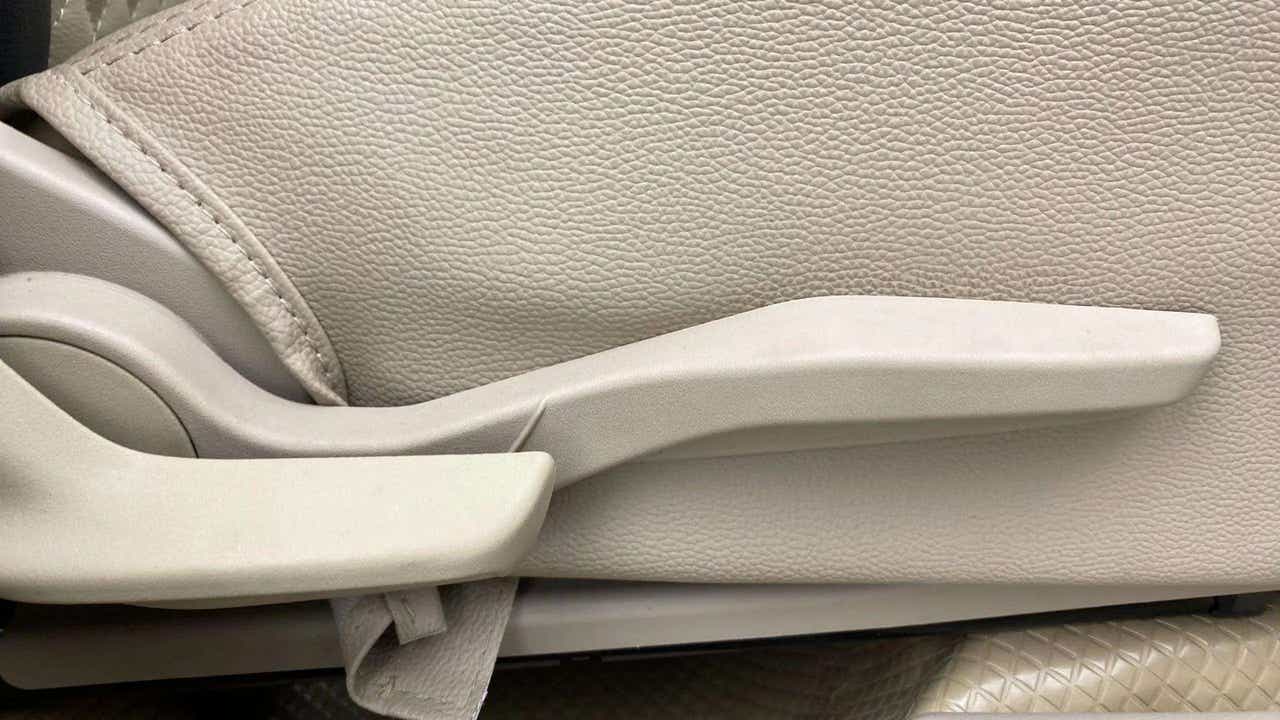 Seat adjuster lever of a Maruti Suzuki Dzire