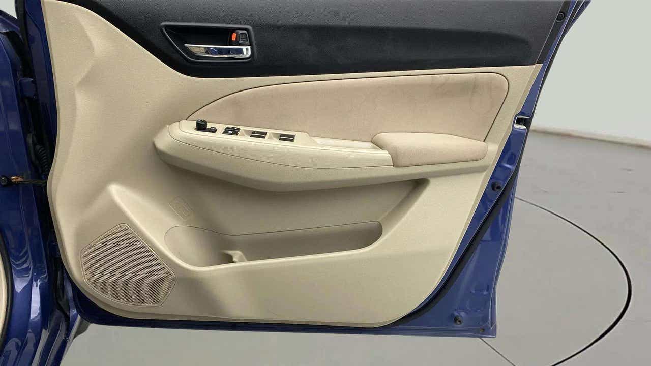 Interior front driver door panel of a Maruti Suzuki Dzire 2018-2023
