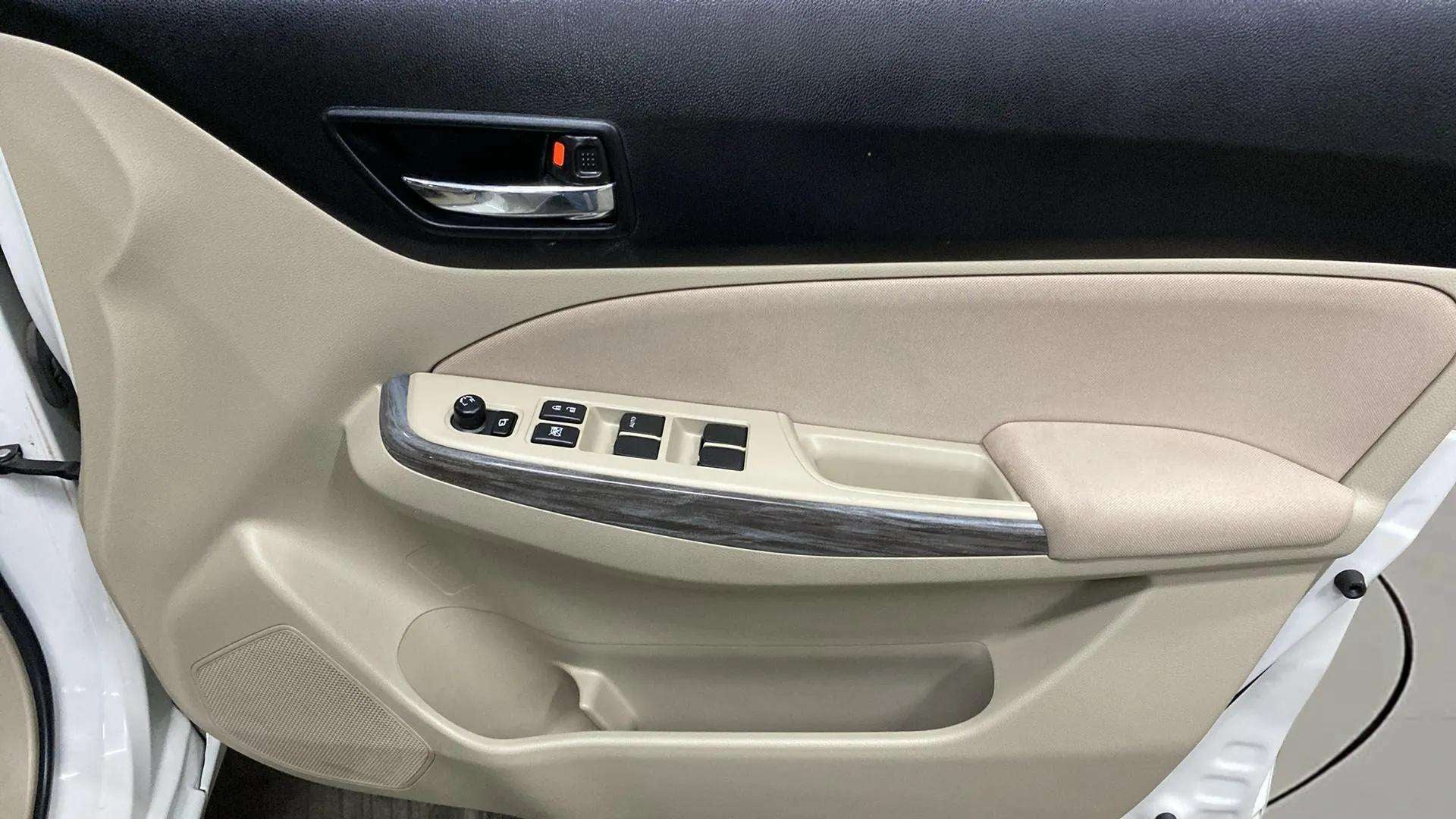 Front interior door panel of a Maruti Suzuki Dzire 2018-2023