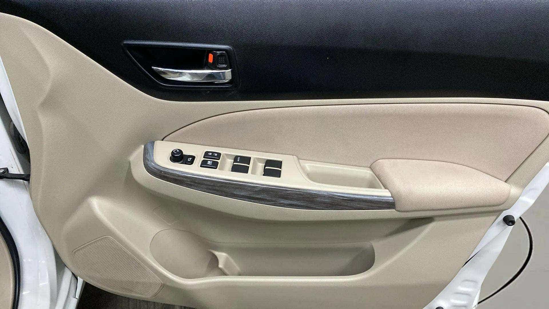 Front interior door panel of a Maruti Suzuki Dzire 2018-2023