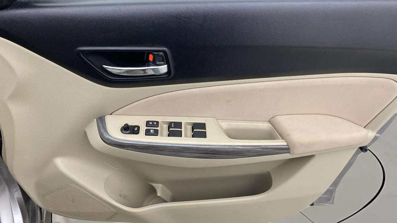 Interior door panel of a Maruti Suzuki Dzire 2018-2023