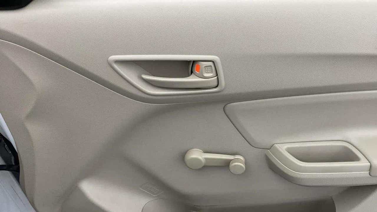 Interior door panel of a Maruti Suzuki Dzire