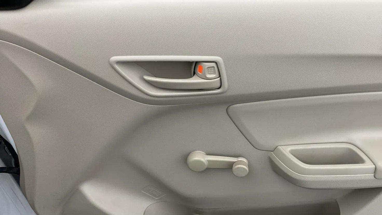Interior door panel of a Maruti Suzuki Dzire