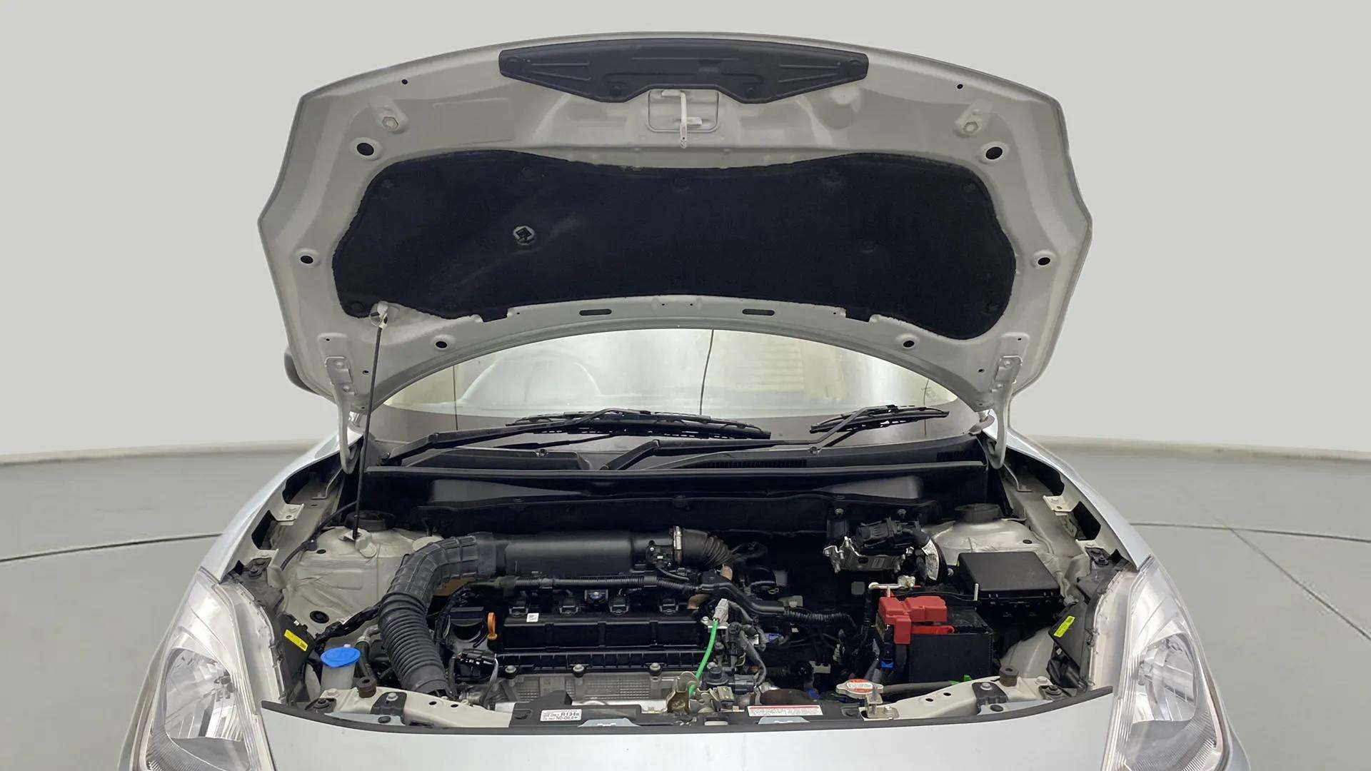 Engine bay of a Maruti Suzuki Dzire 2018-2023