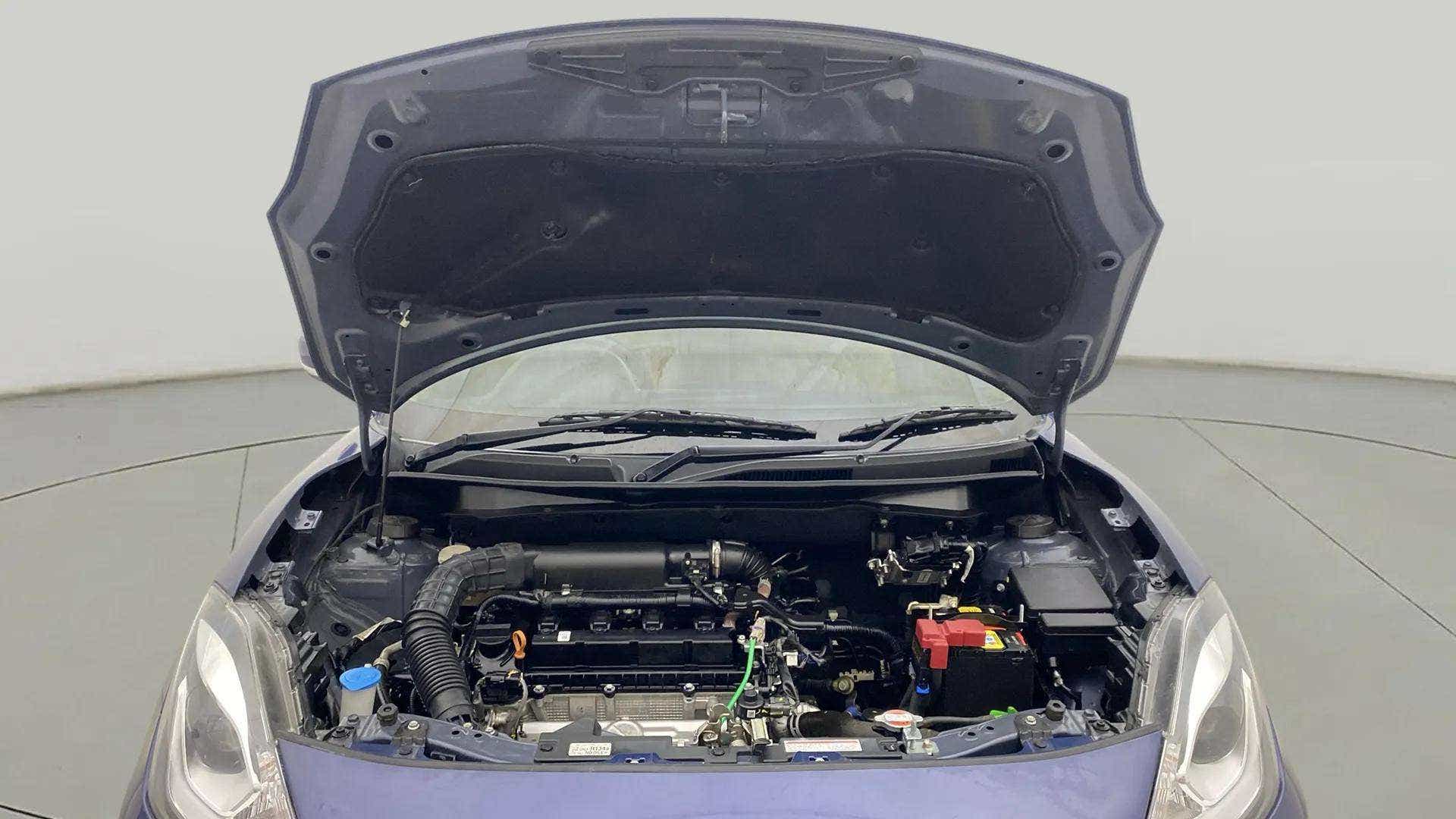 Engine bay view of a Maruti Suzuki Dzire