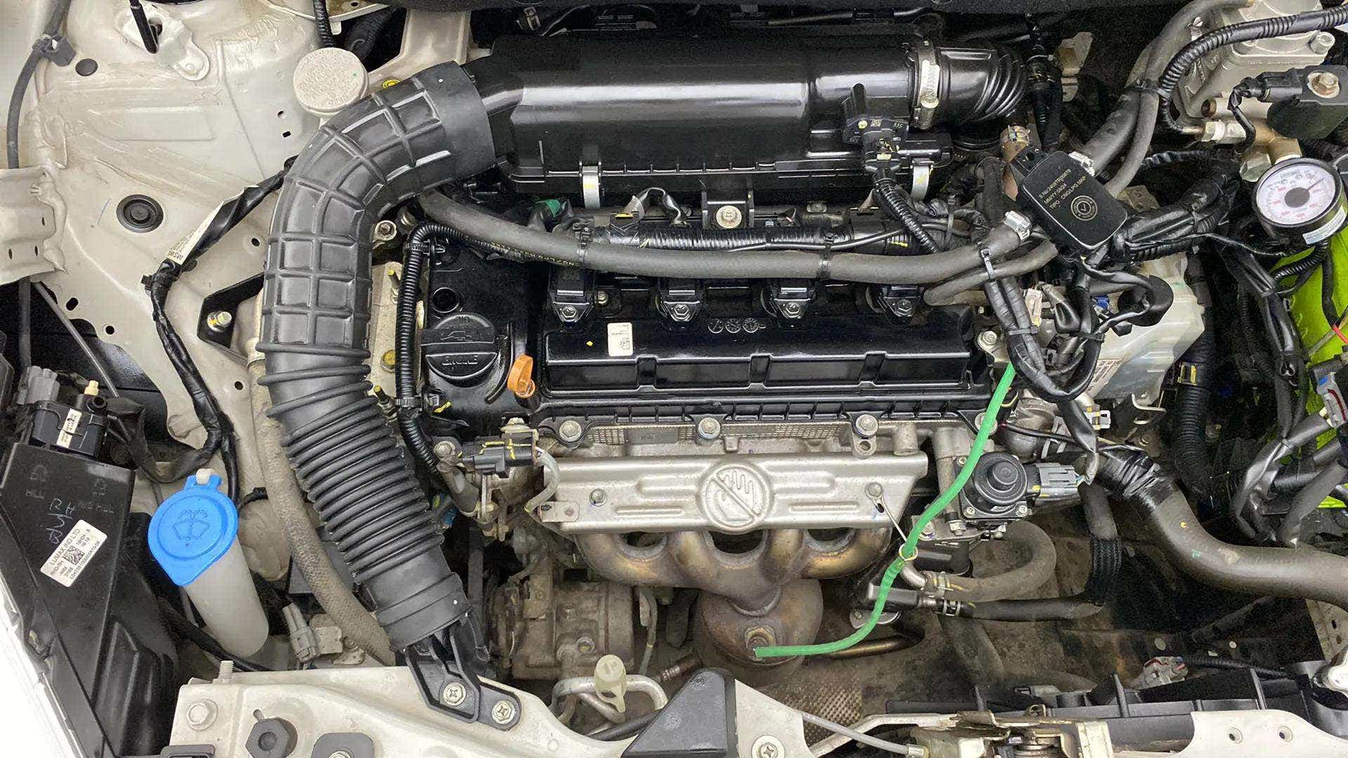 Engine bay of a Maruti Suzuki Dzire
