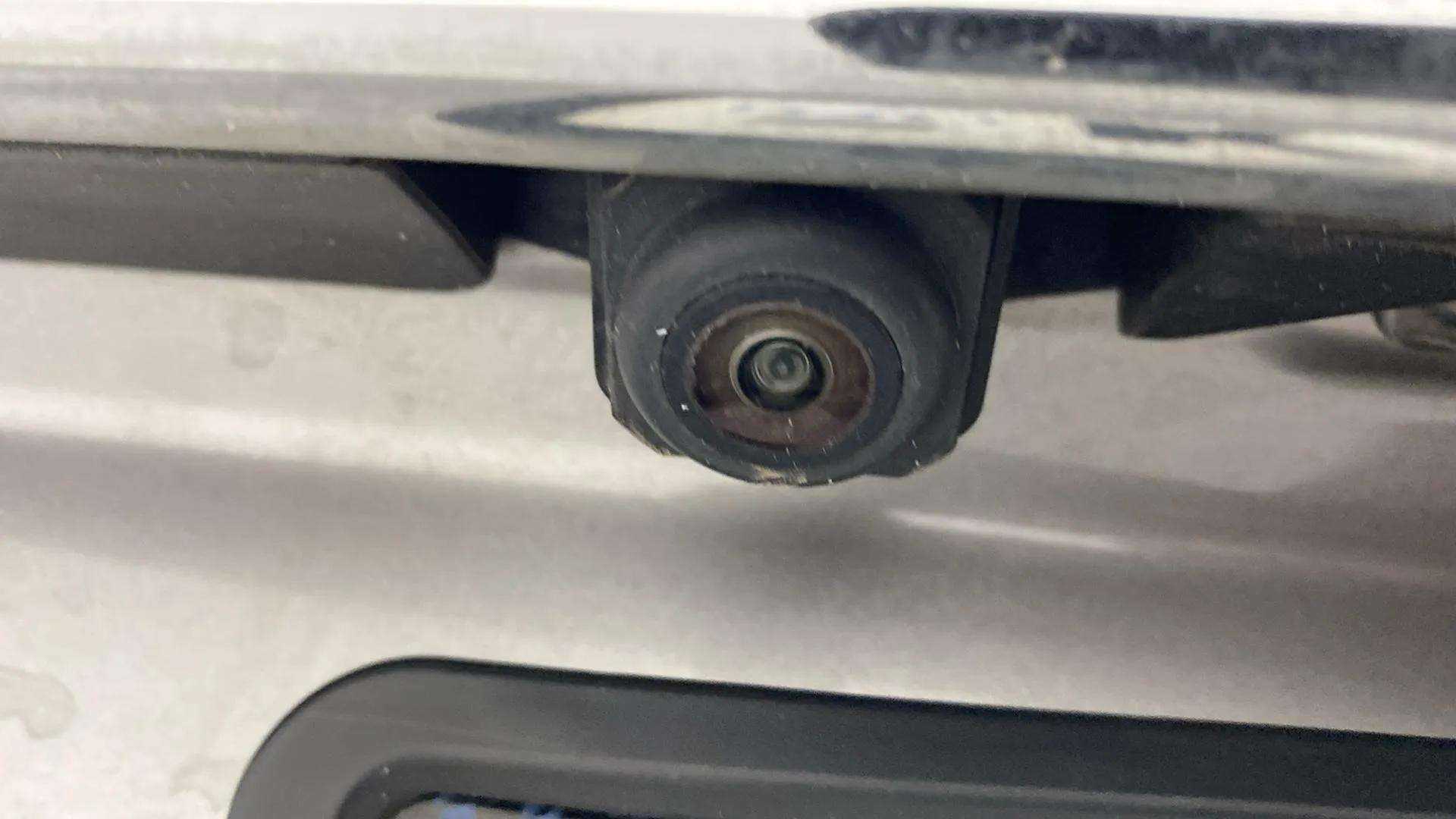 Close-up of rear camera of a Maruti Suzuki Dzire 2018-2023