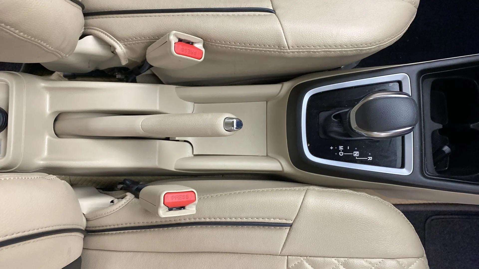 Center console and gear lever of a Maruti Suzuki Dzire