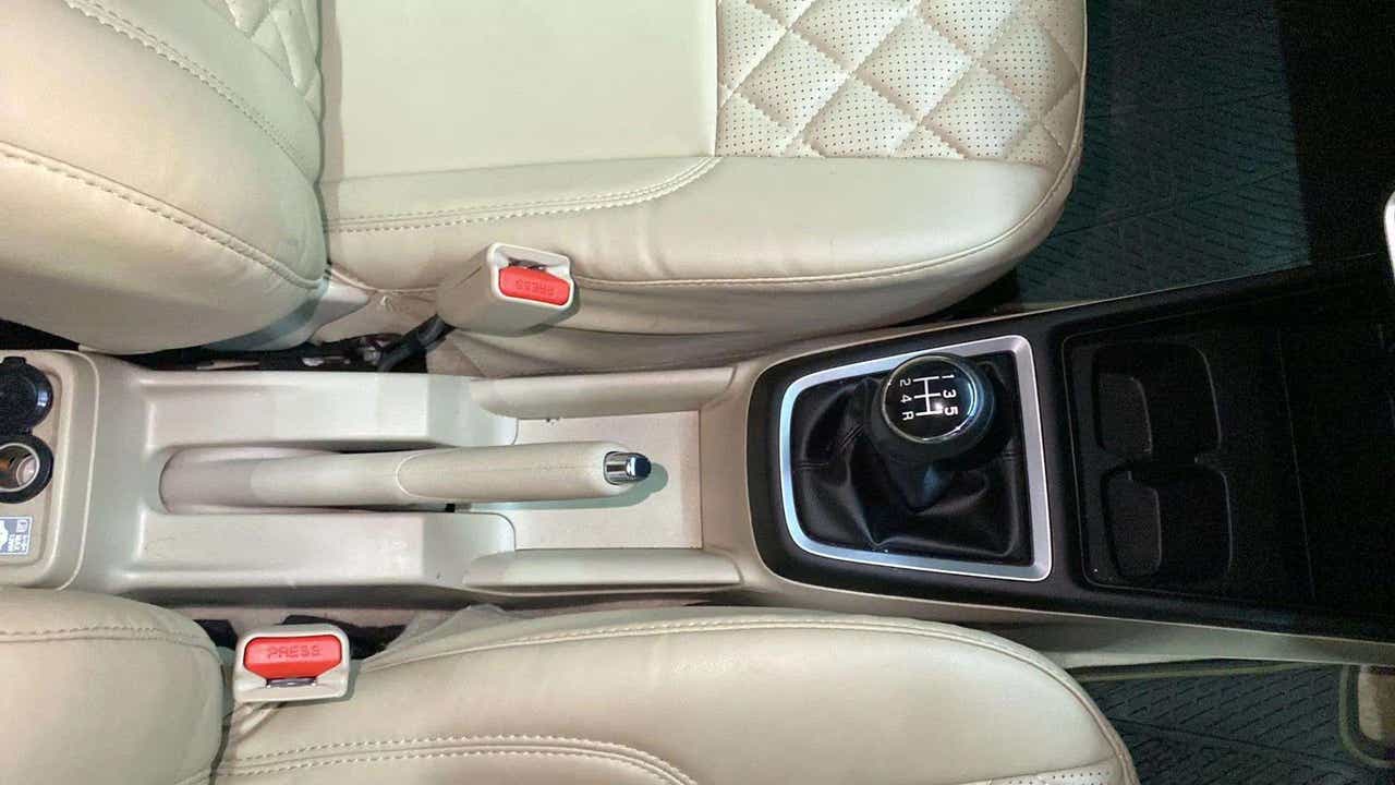 Center console and gear lever area of a Maruti Suzuki Dzire 2018-2023