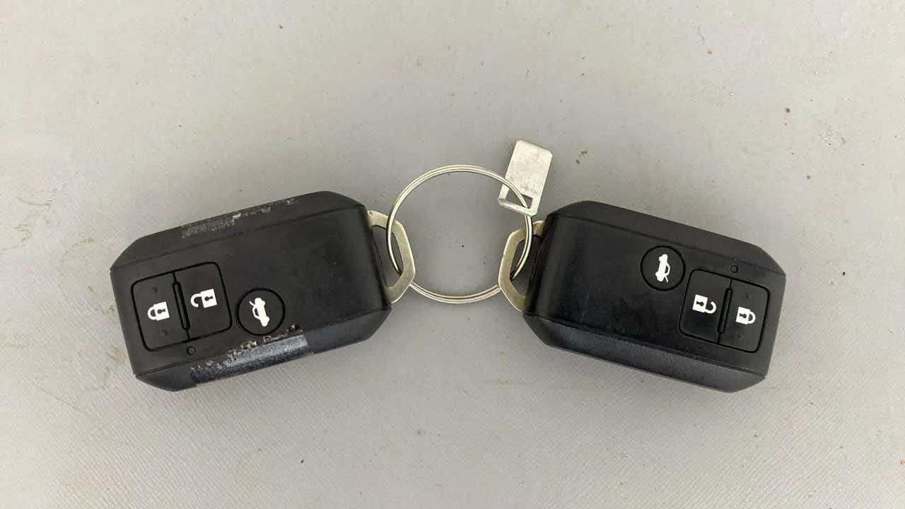 Top view of a Maruti Suzuki Dzire car key fob pair