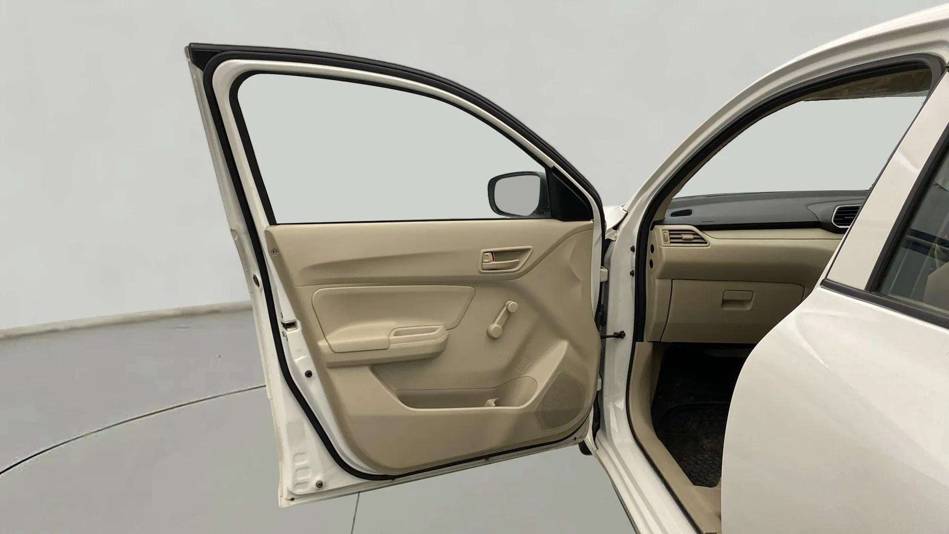 Front left door interior of a Maruti Suzuki Dzire