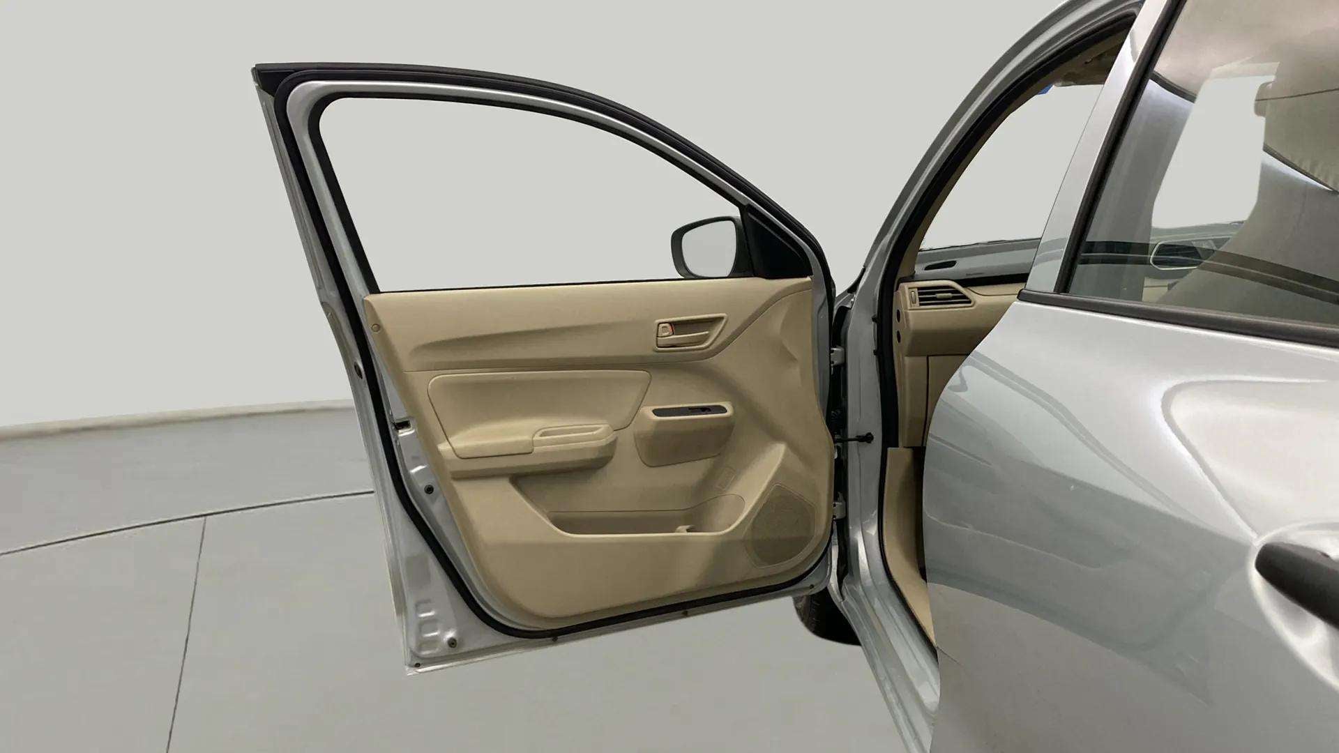 Front left door interior of a Maruti Suzuki Dzire 2018-2023