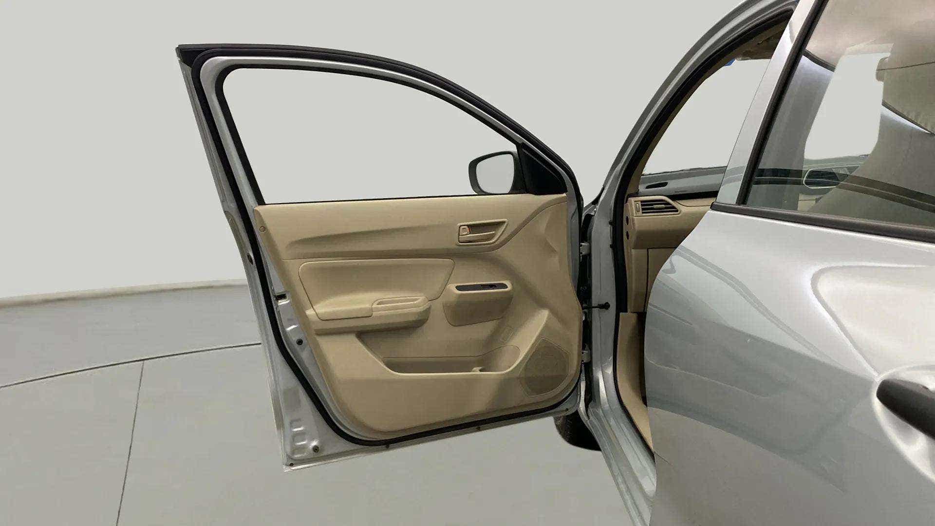 Front left door interior of a Maruti Suzuki Dzire 2018-2023