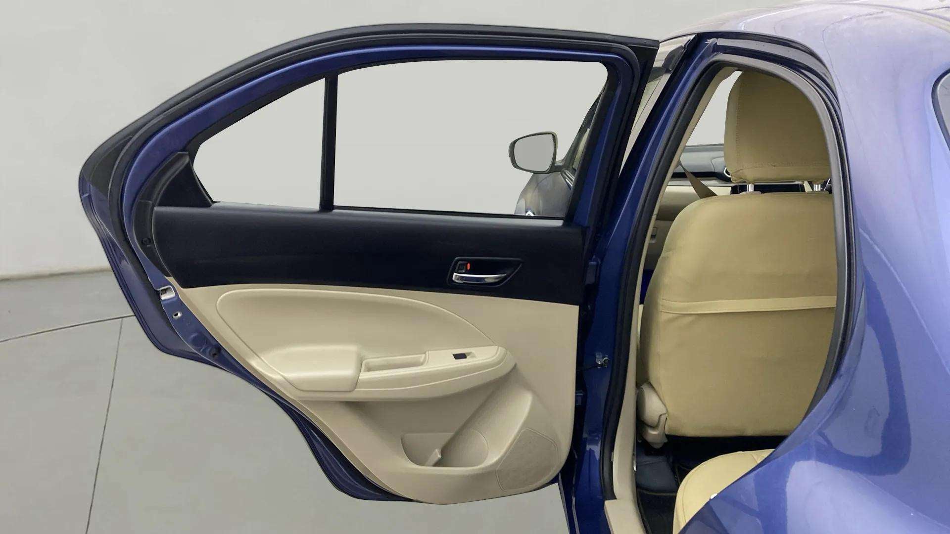 Rear door and seat area of a Maruti Suzuki Dzire