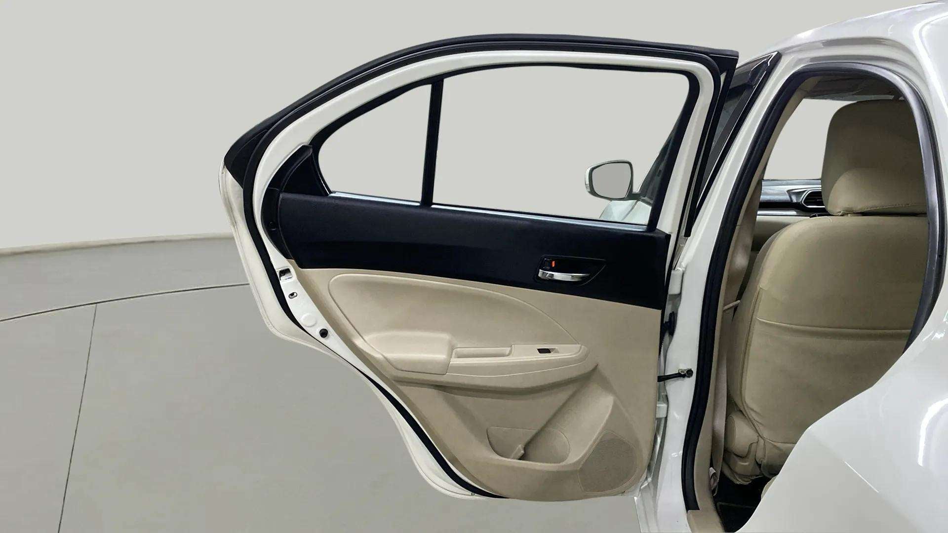 Rear left door interior of a Maruti Suzuki Dzire 2018-2023