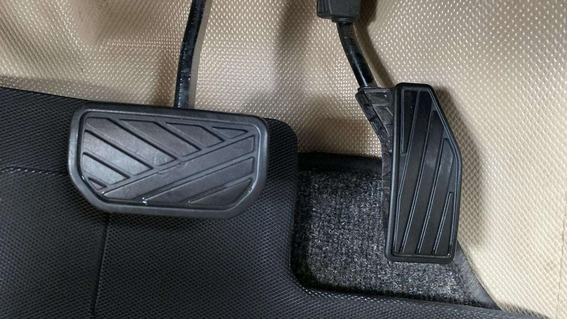 Close-up of pedals of a Maruti Suzuki Dzire 2018-2023