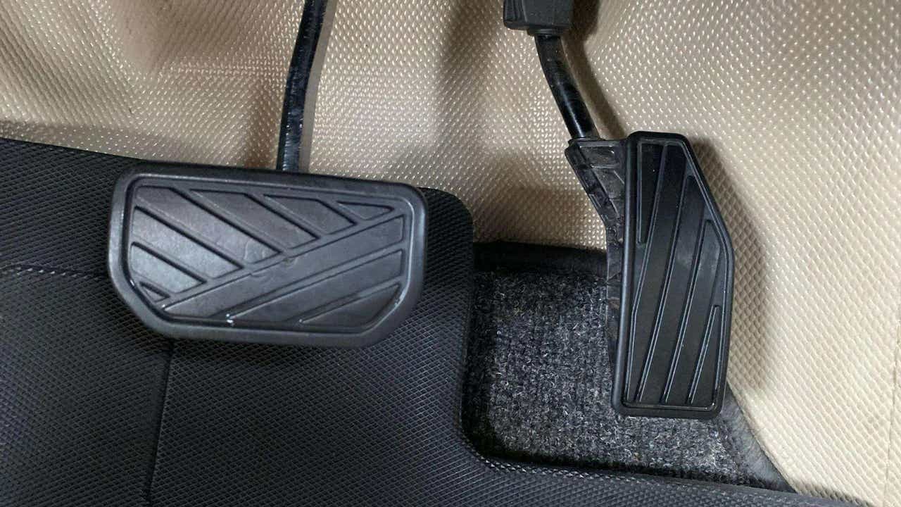 Close-up of pedals of a Maruti Suzuki Dzire 2018-2023