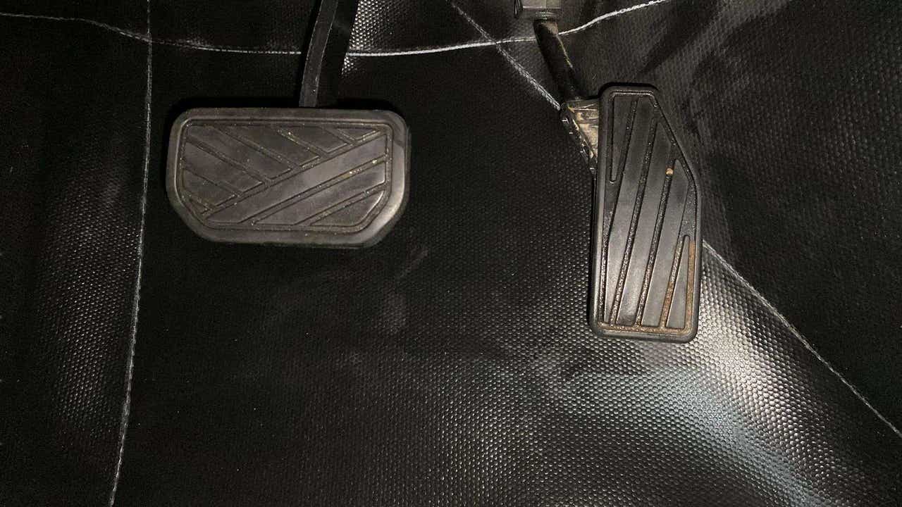 Close-up of pedals of a Maruti Suzuki Dzire 2018-2023