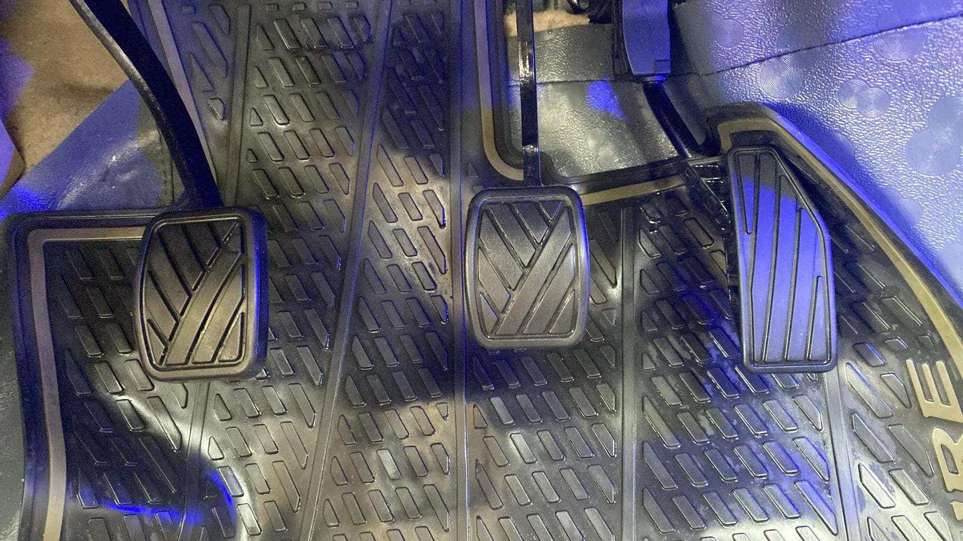 Foot pedals view of a Maruti Suzuki Dzire