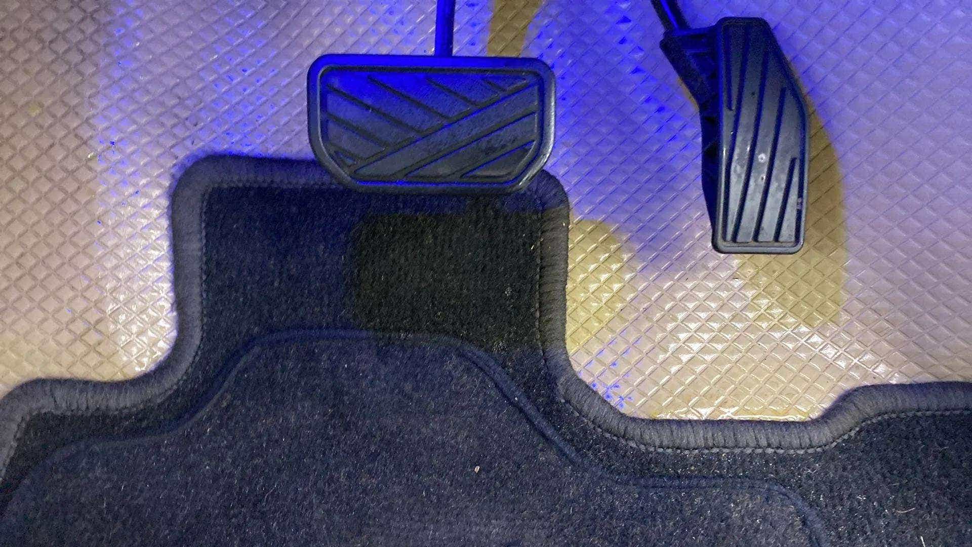 Foot pedal area of a Maruti Suzuki Dzire