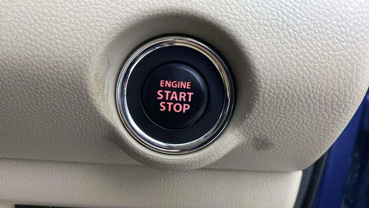 Engine start stop button of a Maruti Suzuki Dzire