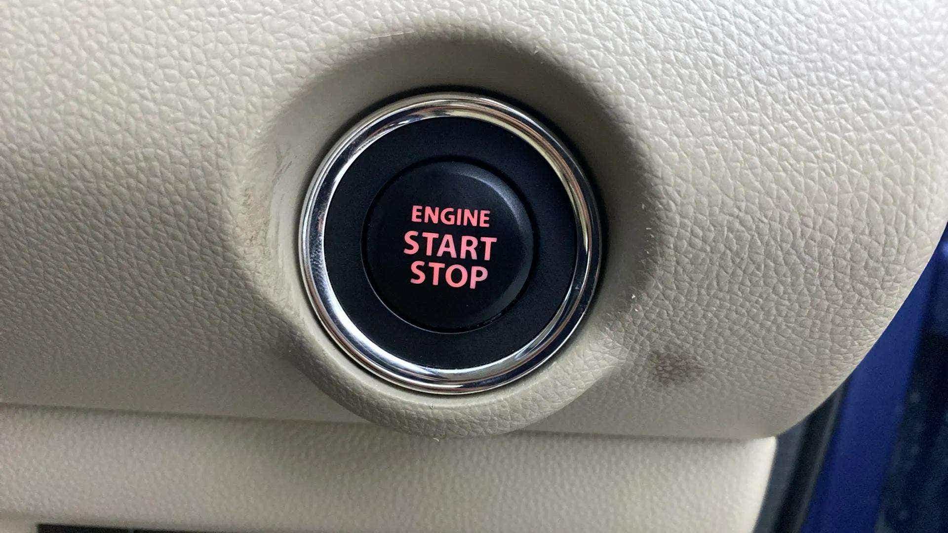 Engine start stop button of a Maruti Suzuki Dzire
