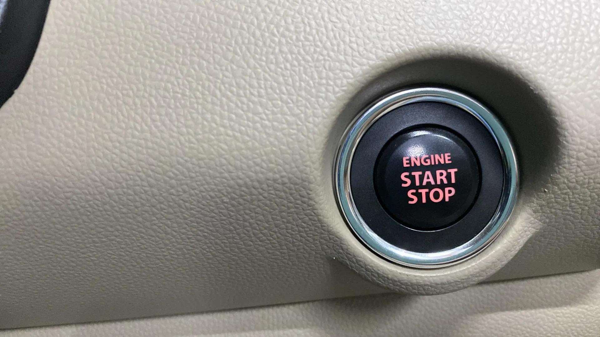 Engine start stop button of a Maruti Suzuki Dzire 2018-2023