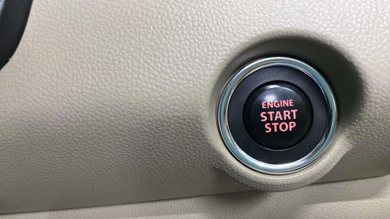Engine start stop button of a Maruti Suzuki Dzire 2018-2023