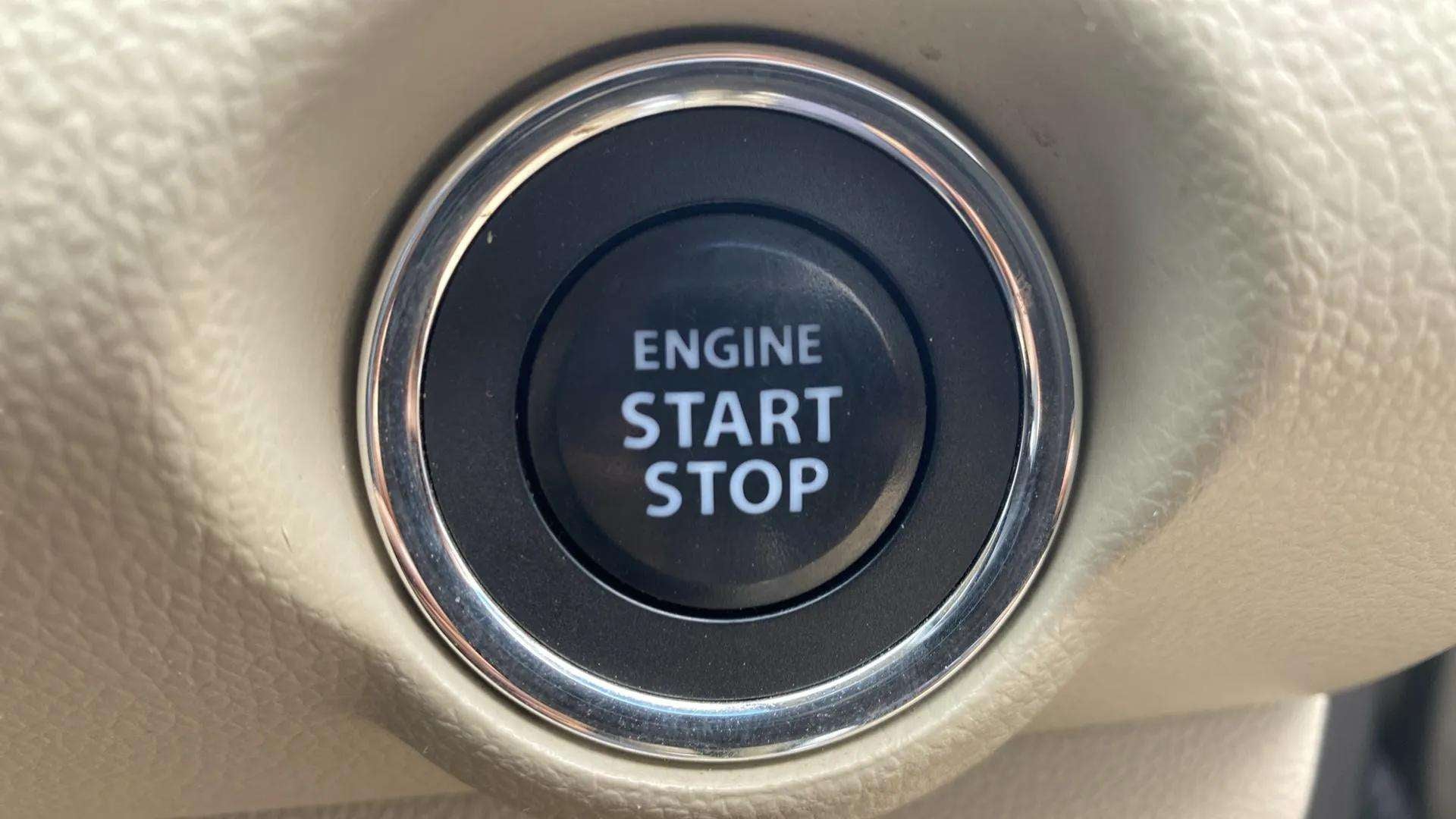 Engine start stop button of a Maruti Suzuki Dzire 2018-2023