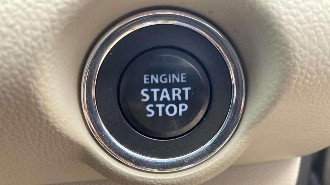 Engine start stop button of a Maruti Suzuki Dzire 2018-2023