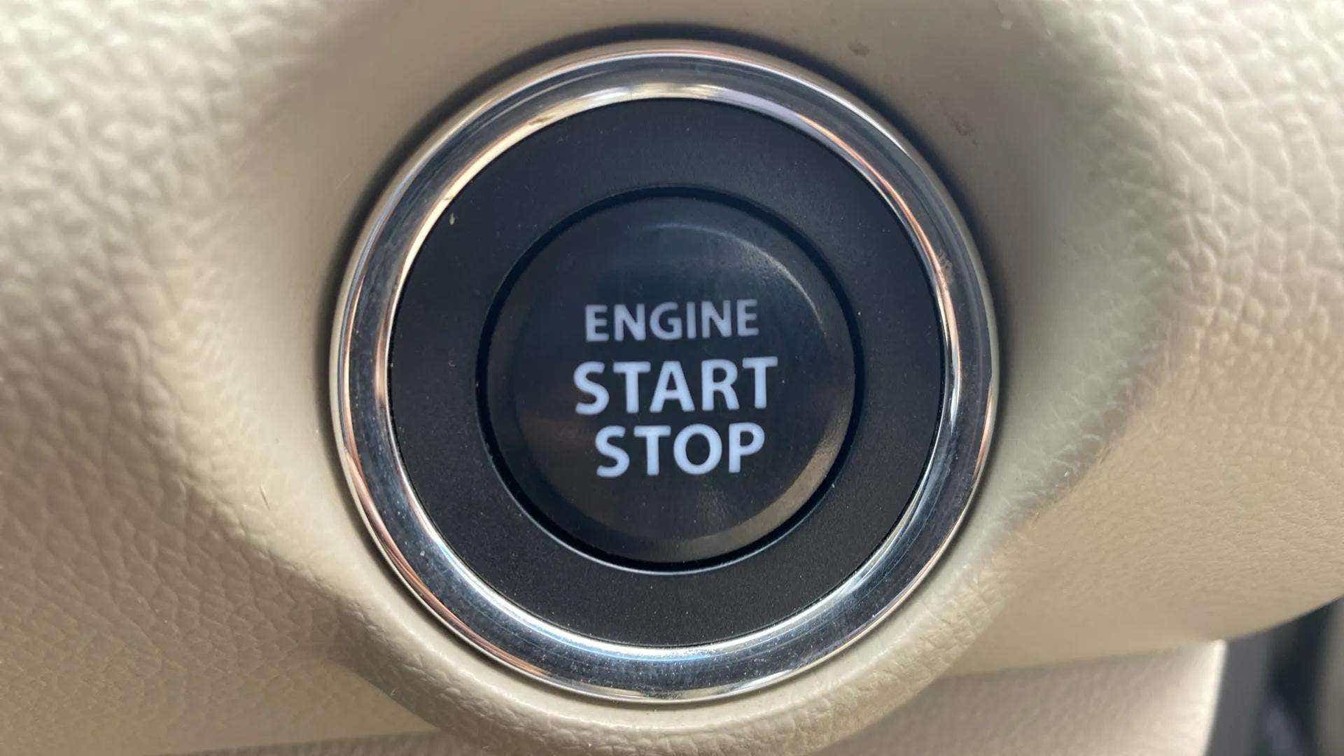 Engine start stop button of a Maruti Suzuki Dzire 2018-2023