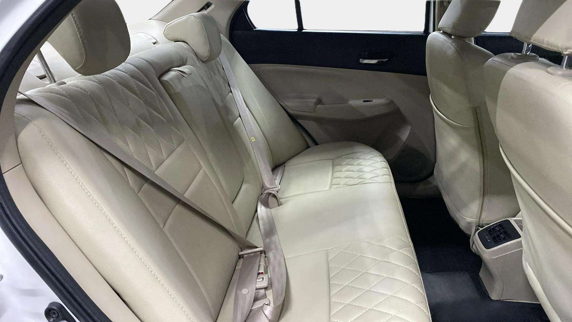 Rear seat and interior of a Maruti Suzuki Dzire 2018-2023