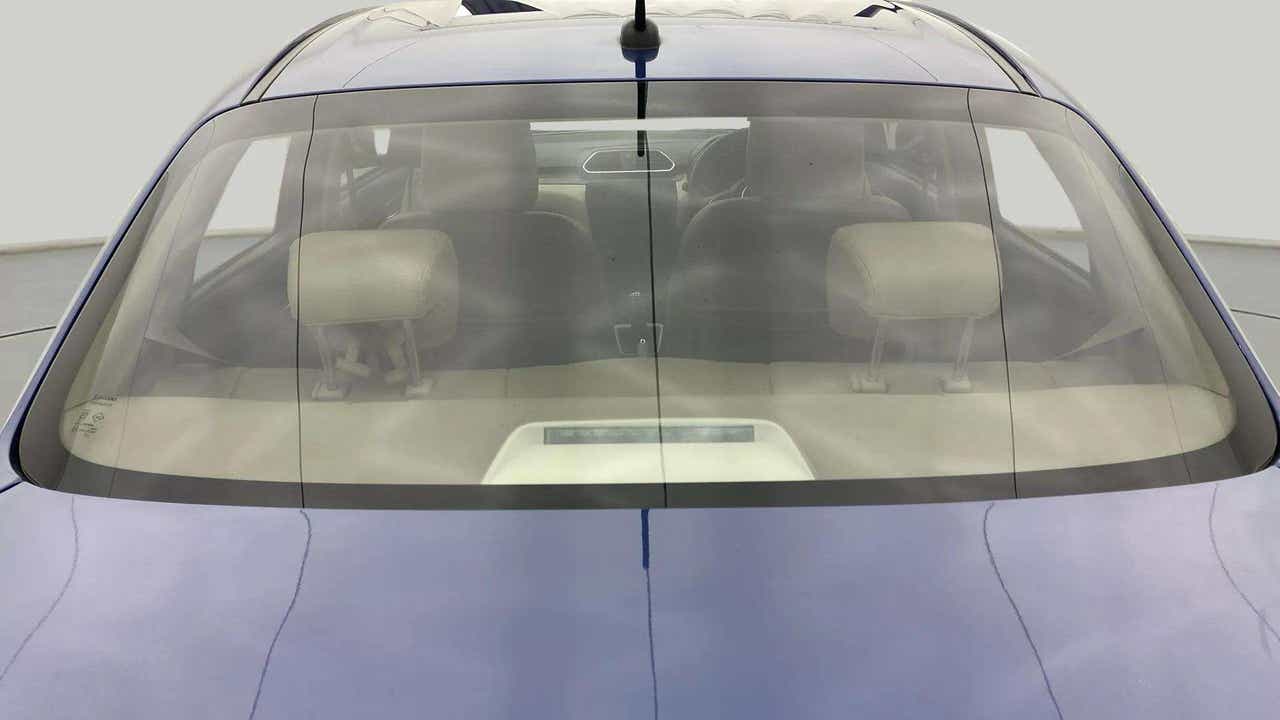 Rear windshield view of a Maruti Suzuki Dzire 2018-2023