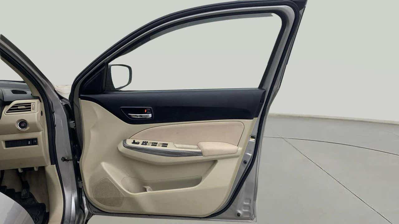 Driver side interior door panel of a Maruti Suzuki Dzire 2018-2023