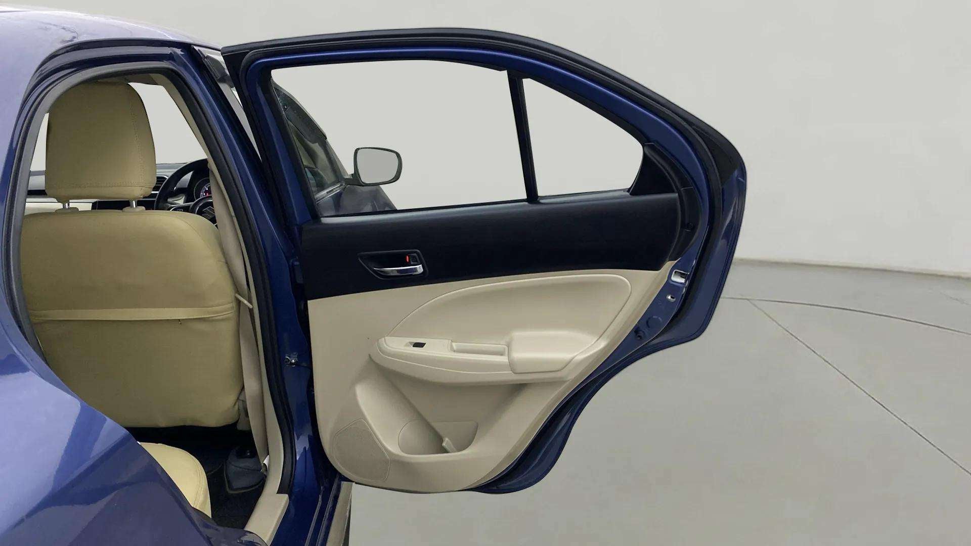 Rear left door and interior of a Maruti Suzuki Dzire